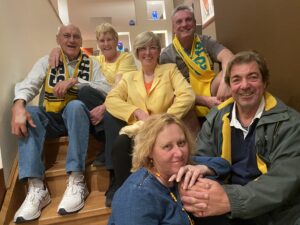 Wear yellow and green the Cooper and Searle family 